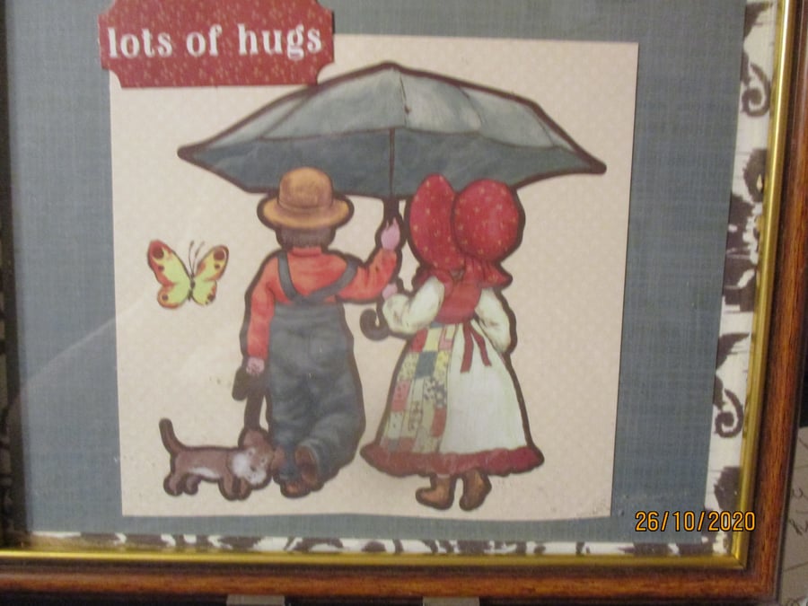 Lots of Hugs Girl and Boy under Umbrella Picture