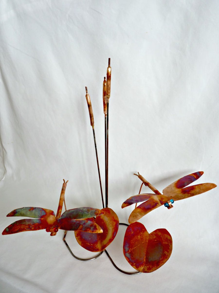Dragonflies and bulrushes