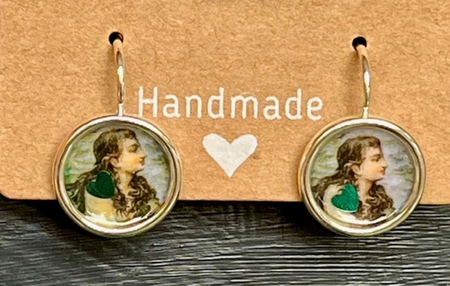 Vintage mermaid's face silver and resin earrings