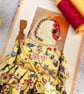 Sappho,  A Tiny Hand Embroidered Goldfinch Folk Art Doll