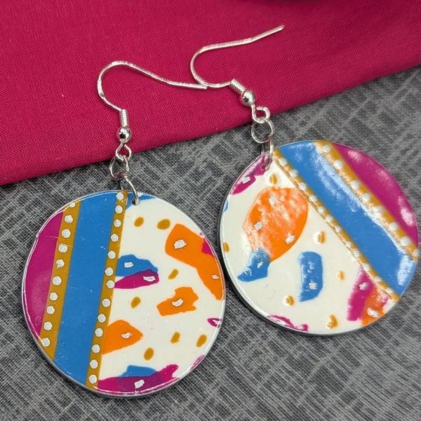 Bold and bright circular drop earrings 