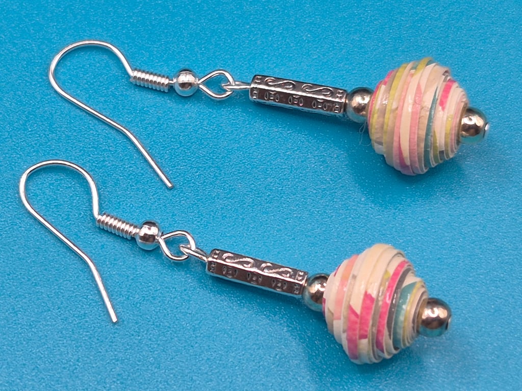 Drop earrings made with handrolled pastel paper beads and ornate metal