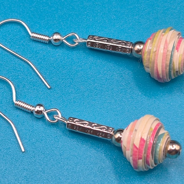 Drop earrings made with handrolled pastel paper beads and ornate metal