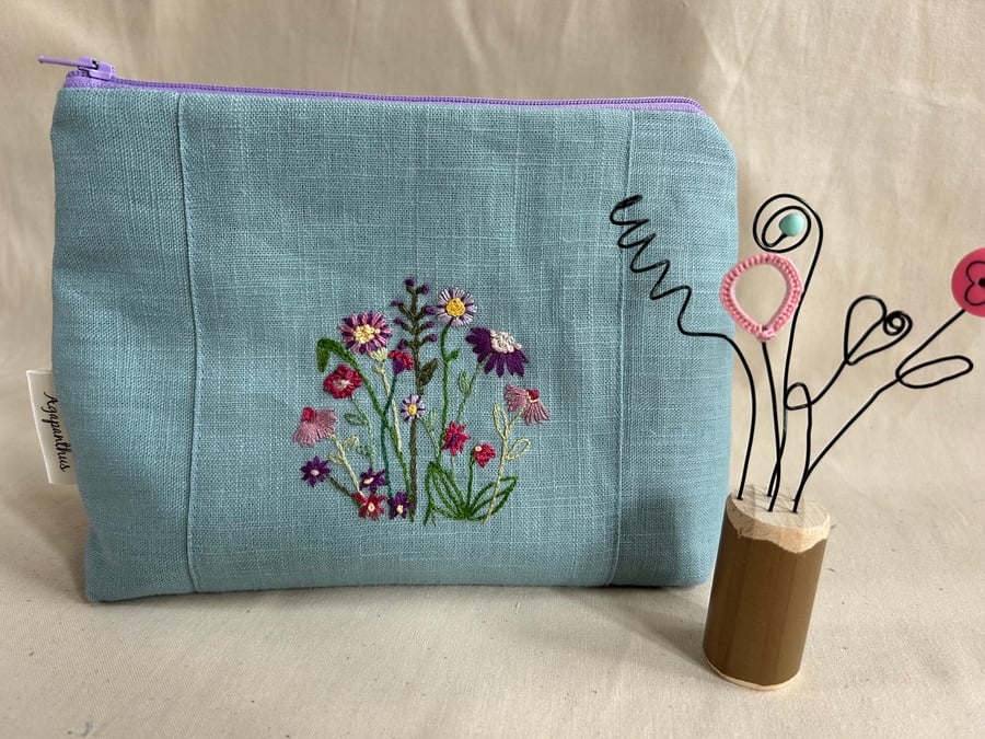 Hand embroidered make up bag