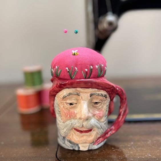 Pin cushion in repurposed vintage Toby jug embroidered flowers and bee