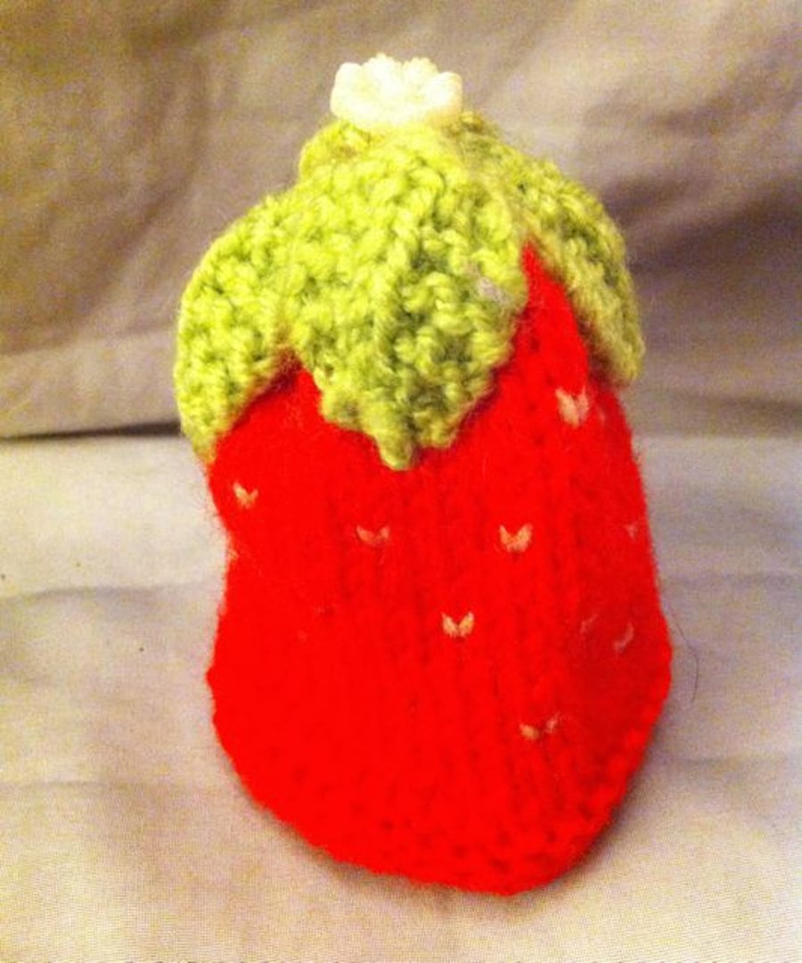 Little knitted strawberry egg cup cosy