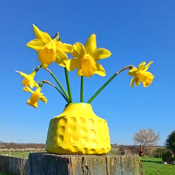 Small bright yellow bud vase 
