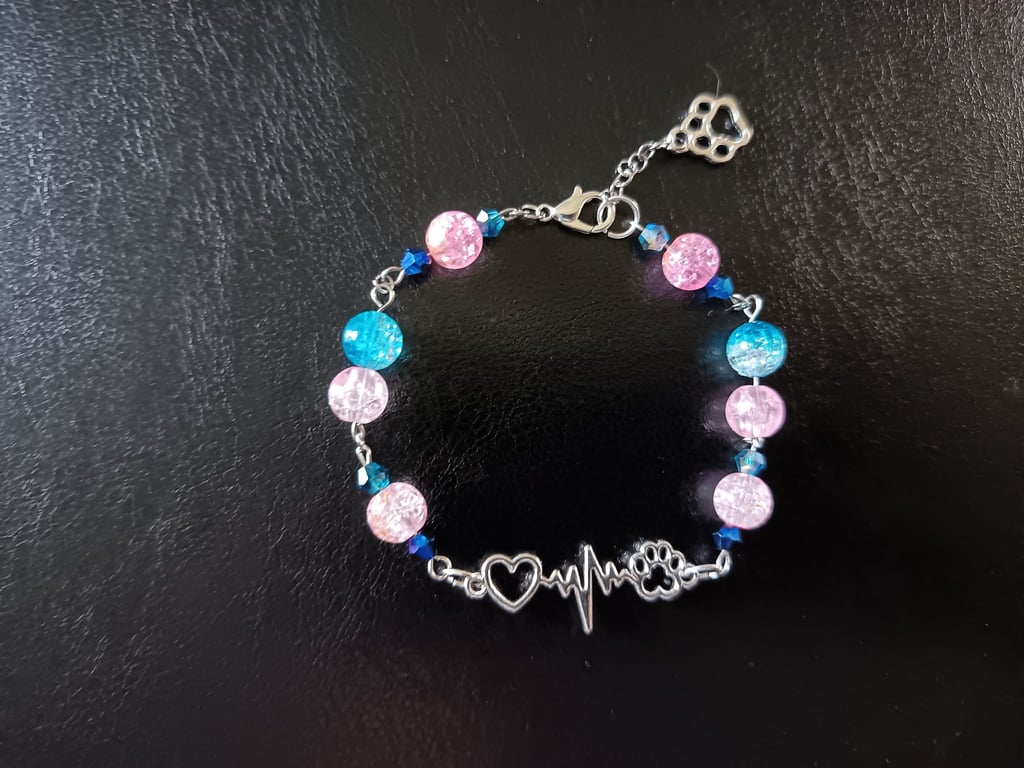 Silver paw and heart charm bracelet with blue and pink beads and lobster clasp