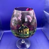 A hand painted and fired glass goblet vase by Andrew Jenkins 