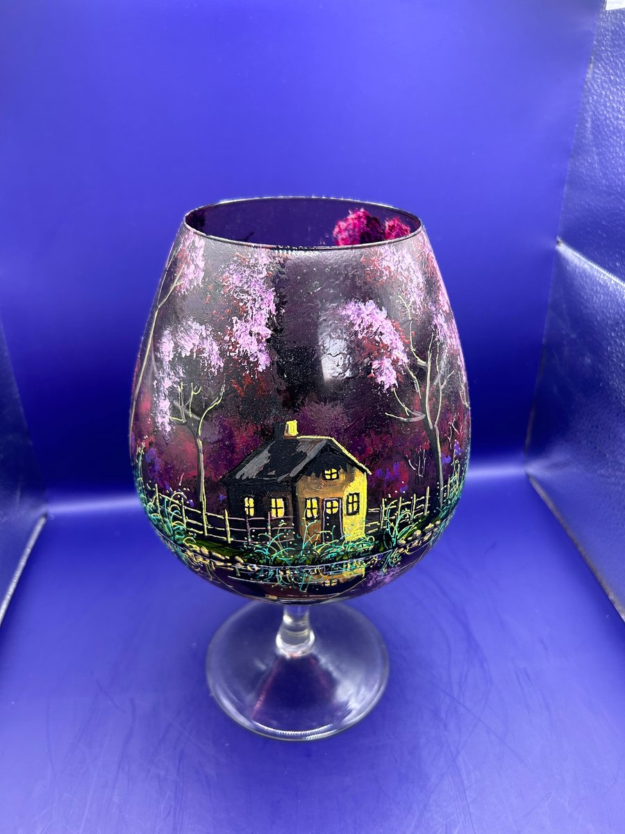 A hand painted and fired glass goblet vase by Andrew Jenkins 
