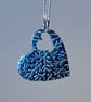 Silver heart with cut out heart detail and lovely texture 