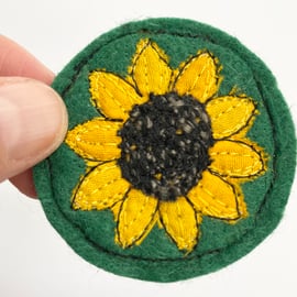 Upcycled sunflower brooch pin or badge. 
