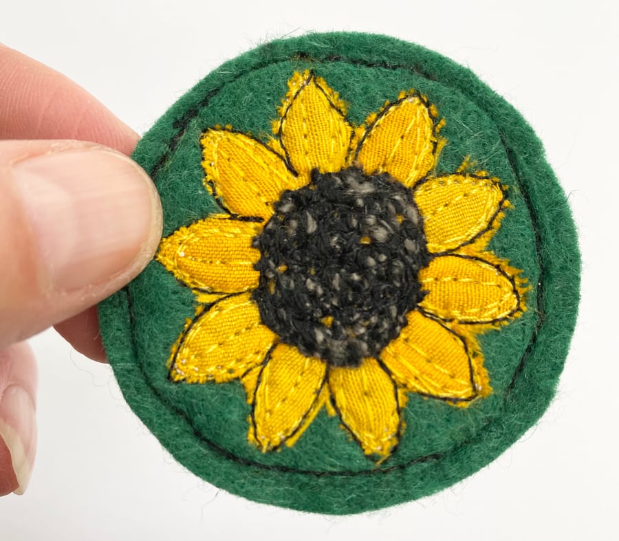 Upcycled sunflower brooch pin or badge. 
