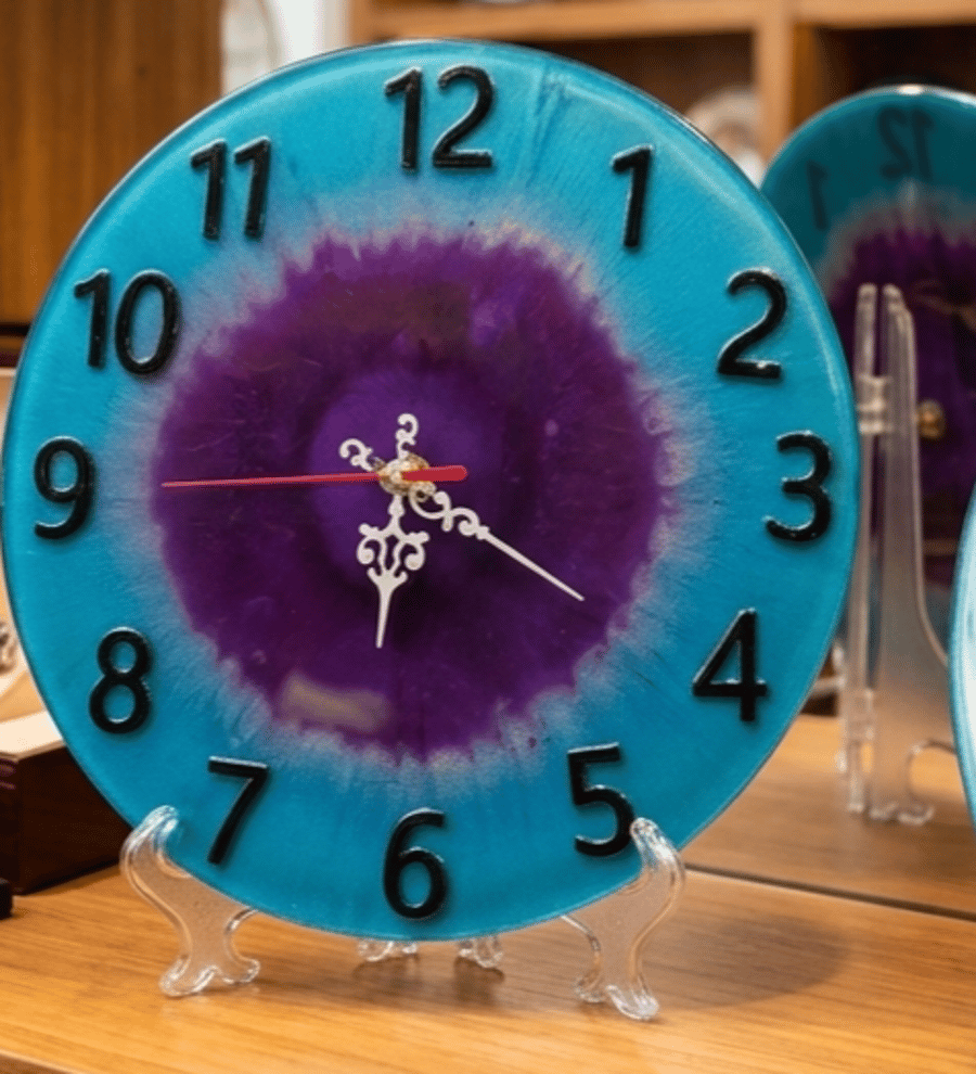 Handmade teal and purple epoxy resin clock with hanger. Battery operated.
