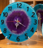 Handmade teal and purple epoxy resin clock with hanger. Battery operated.