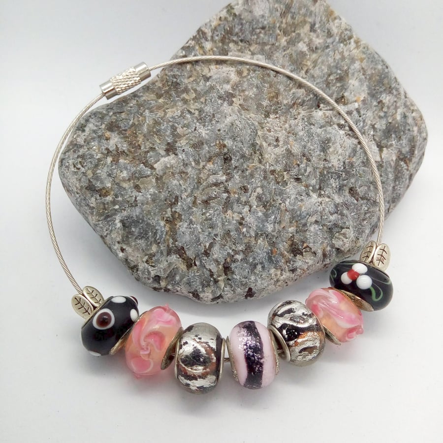 Pink and Black European Lampwork Bead Bracelet on a Memory Wire Band