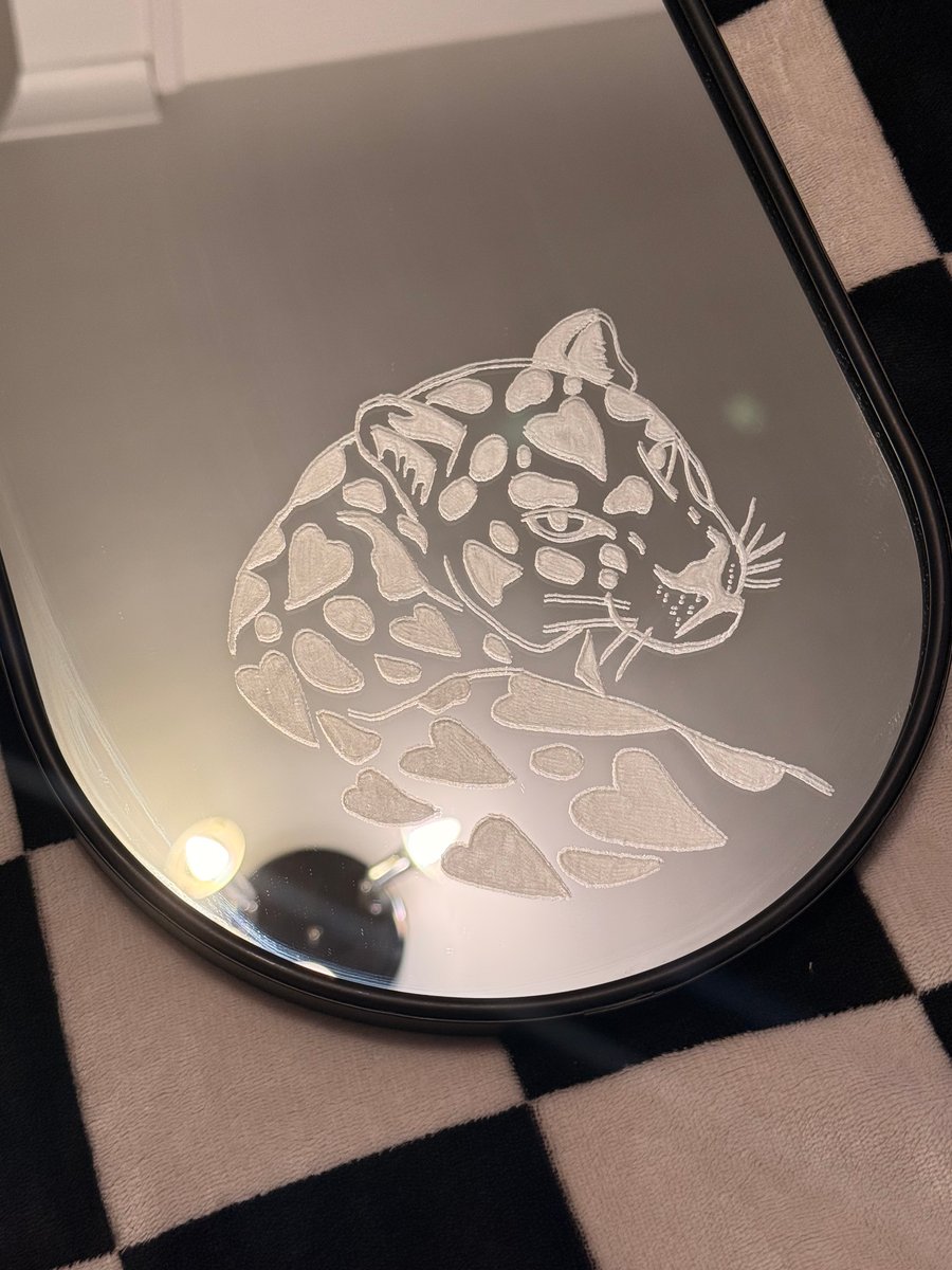 Engraved mirror