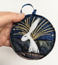 Upcycled embroidered winter hare home decoration.  - Image 1