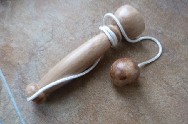 CUP AND BALL GAME