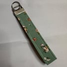 Green Floral Wristlet