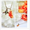 Bumble bee and amber coloured shell bead honeycomb necklace