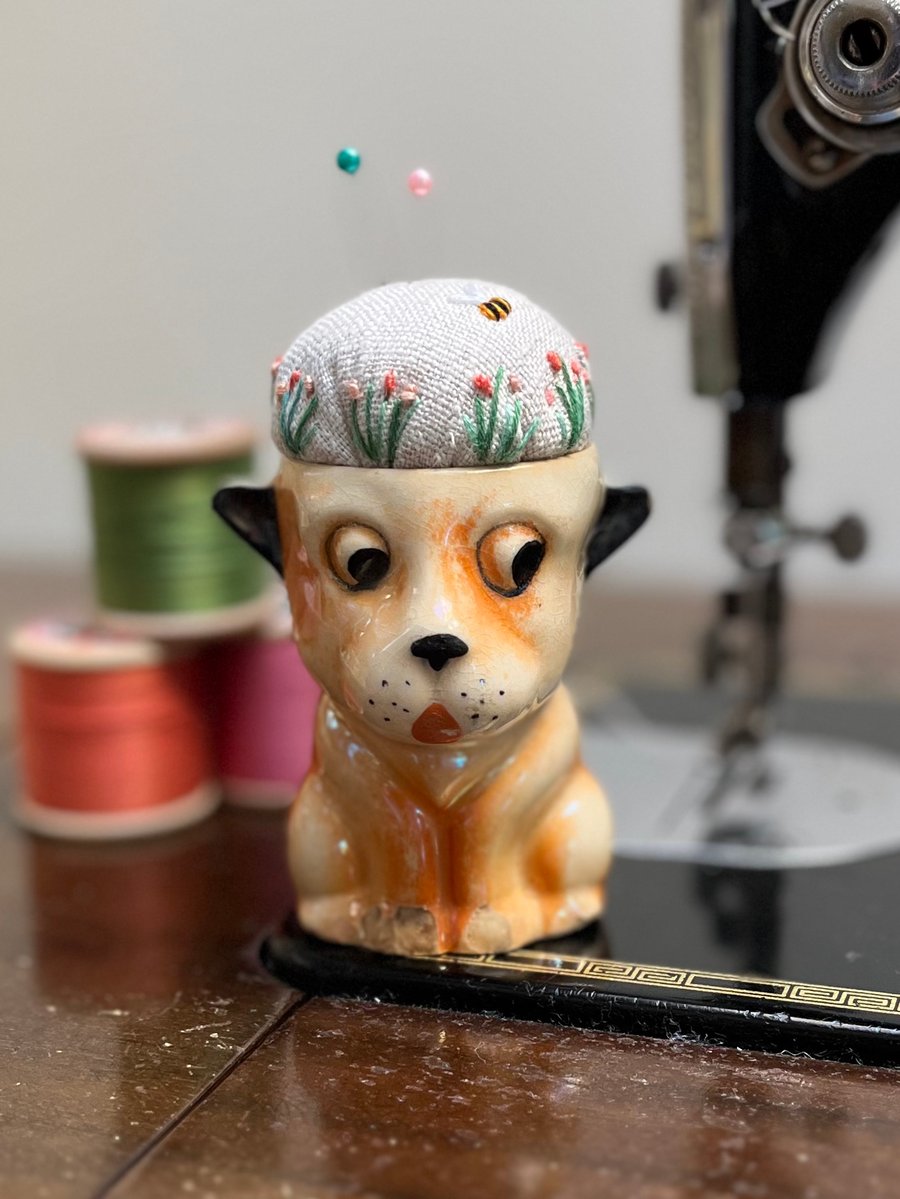 Pin cushion in a vintage dog egg cup embroidered flowers and bee