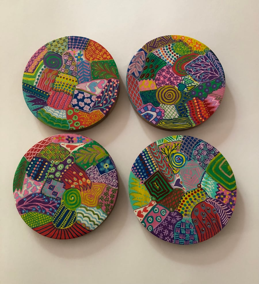 Set of 4 up cycled  hand painted coasters