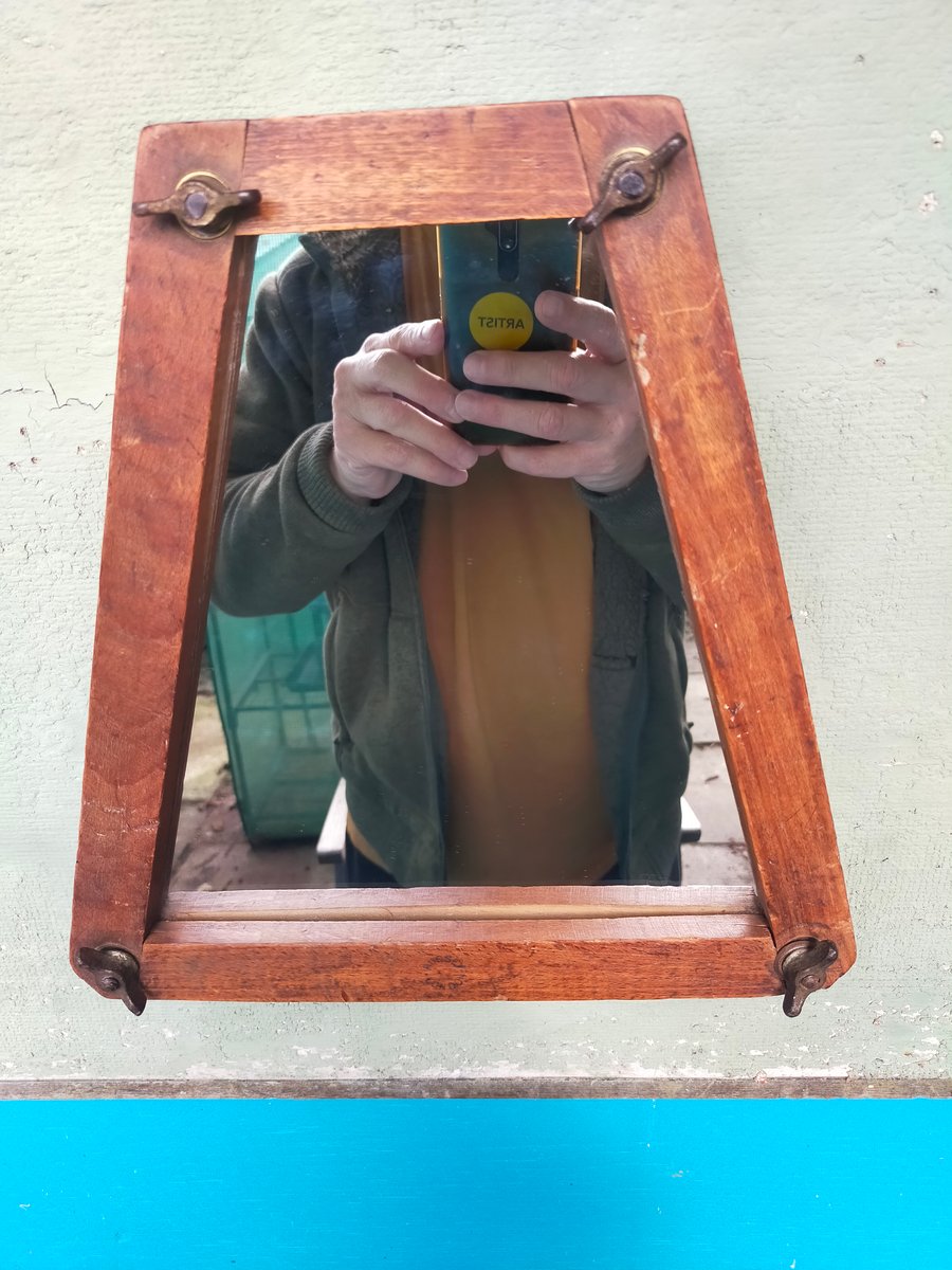 Vintage tennis racket press mirror