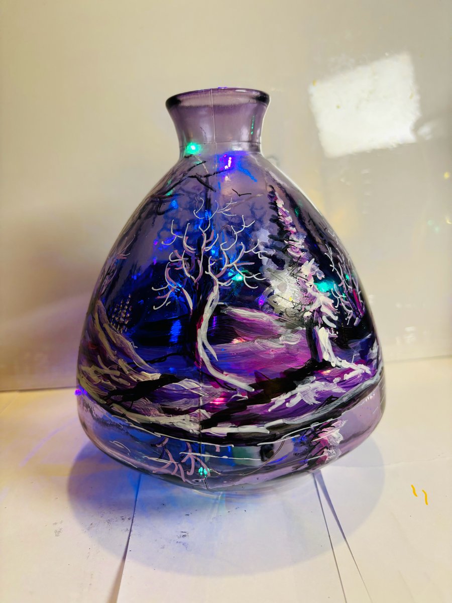 A hand painted and fired glass vase by Andrew Jenkins 