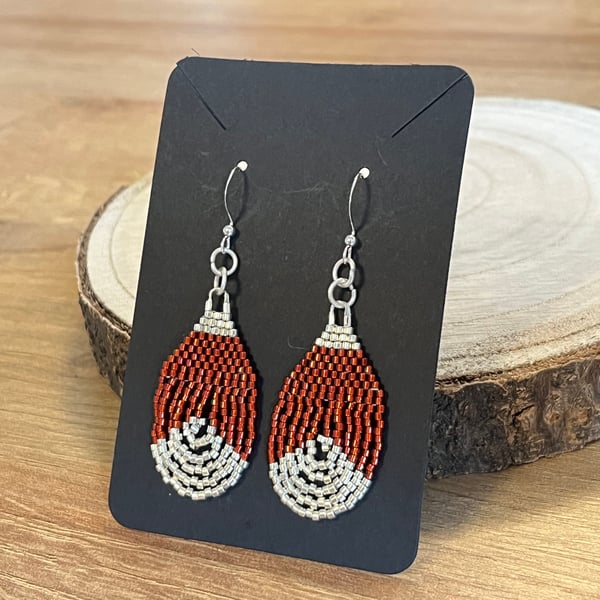 Beadwork teardrop earrings in shiny maroon red and silver