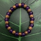Handmade beaded bracelet with amethyst and gold coloured beads