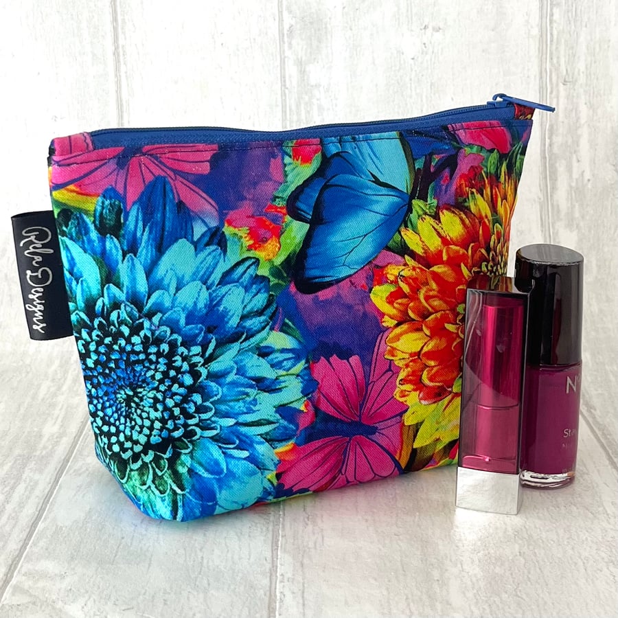 Cosmetic bags, bright flower and butterflies 