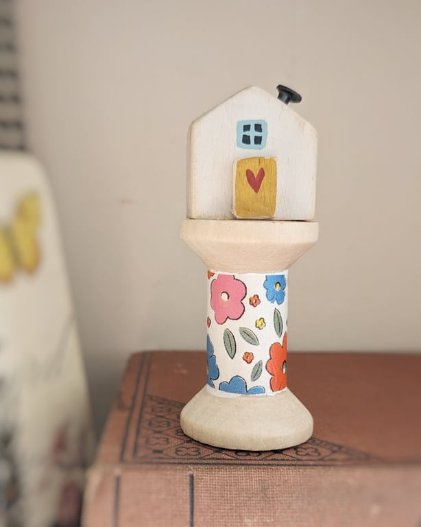 Little Wooden House on a Floral Wooden Bobbin 