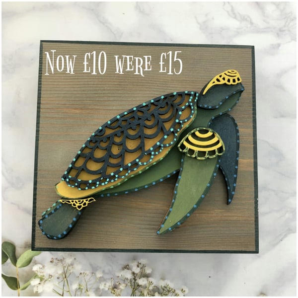 Layered wood turtle on freestanding wood block 