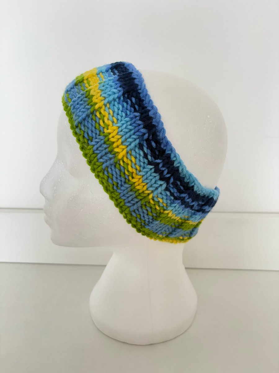 Hand knitted headband. 