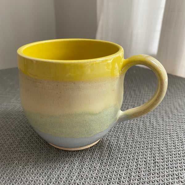 Handmade yellow and grey mug