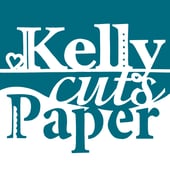 Kelly Cuts Paper