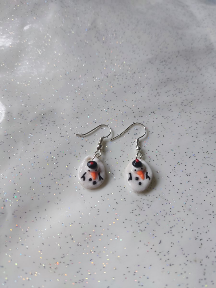 Handmade polymer clay melted snowman earrings