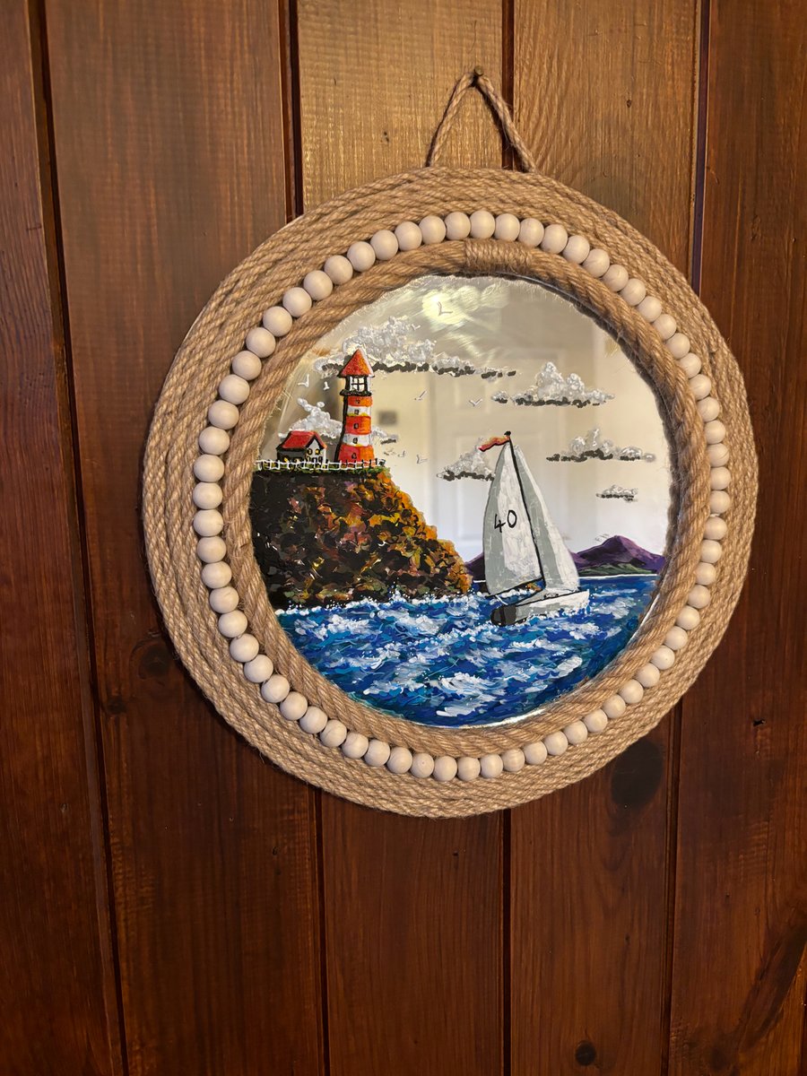 A hand painted and fired glass mirror by Andrew Jenkins 