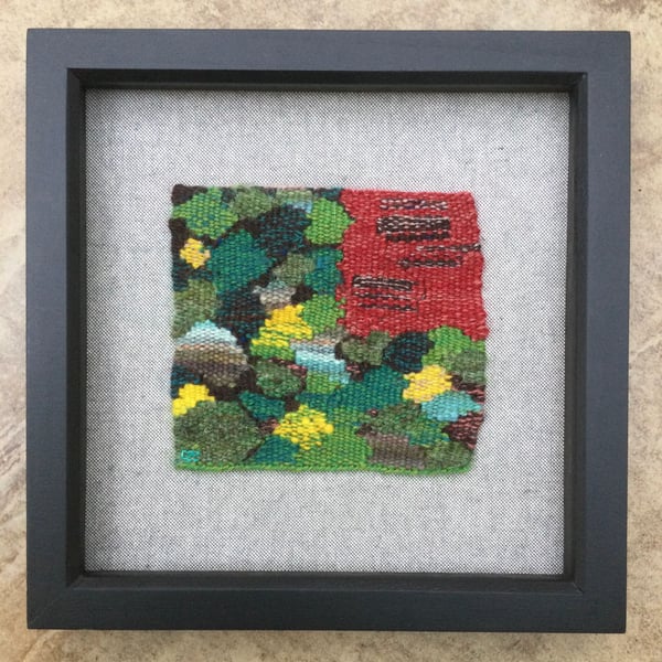 Framed handwoven tapestry weaving, textile art in green, yellow and red