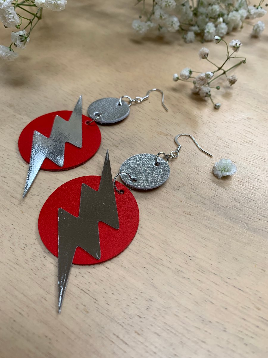 Red and silver leather handmade earrings with lightning bolt