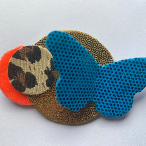 Circles and butterfly fabric brooch inspired by Scottish wildlife 