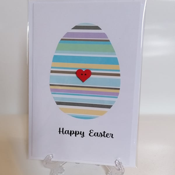 Happy Easter - blue striped Easter egg with a heart button greetings card 