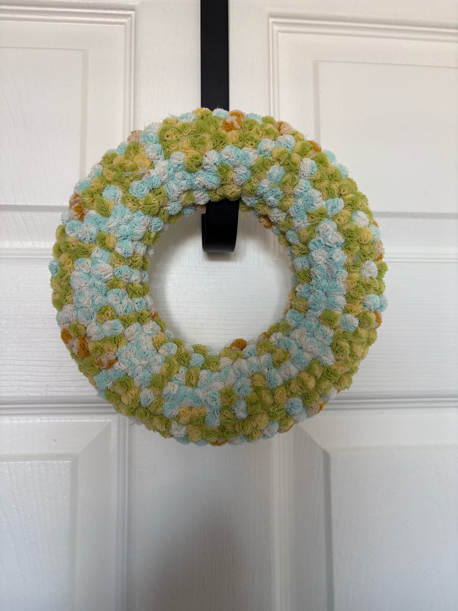 Baby boy scrunchy Pom Pom wreath. 
