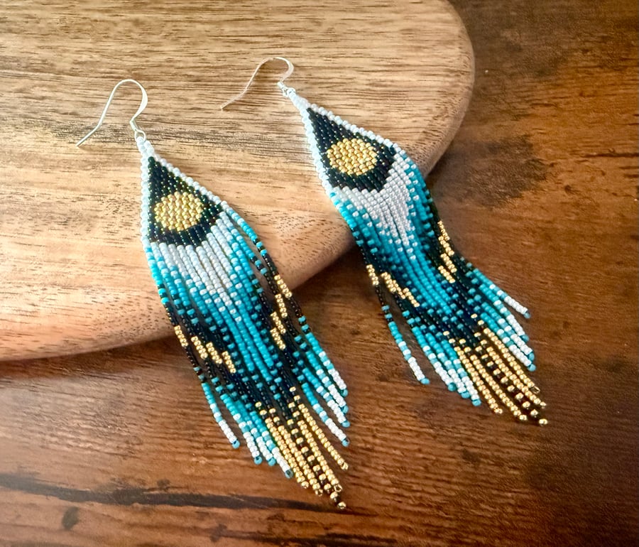 Handmade beaded feather-inspired fringe earrings in turquoise, gold & black