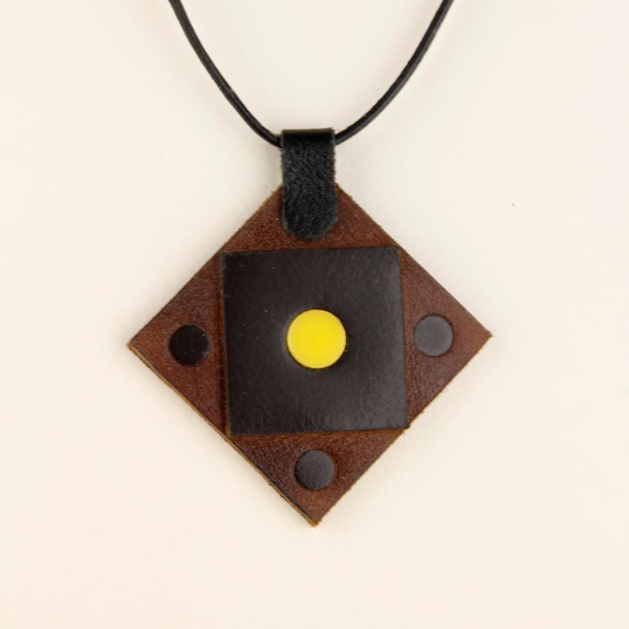 24 - DIAMOND SHAPED BROWN LEATHER PENDANT