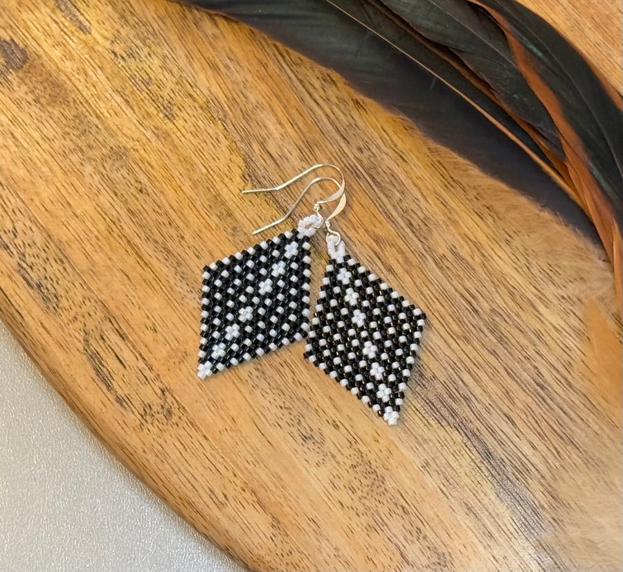 Black and white monochrome beadwork earrings with spots and dots
