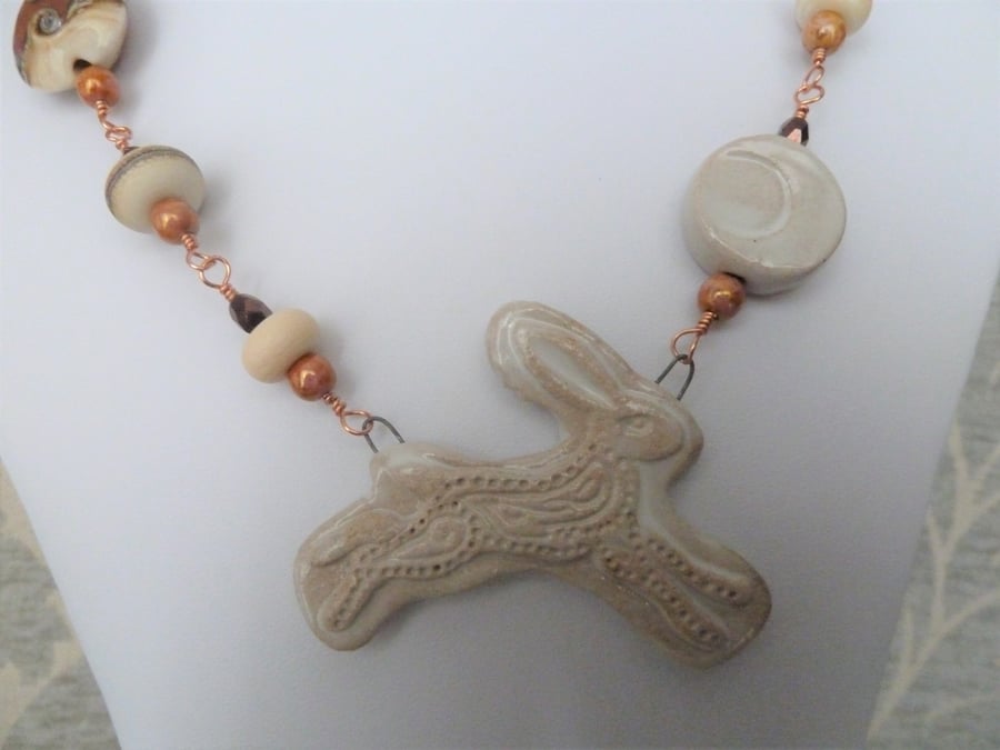 ceramic moon hare necklace, copper and lampwork jewellery
