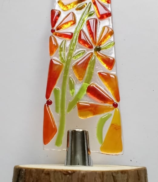 Fused glass Worry Poppet with flowers