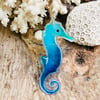 Hanging seahorse fused glass sun catcher on driftwood 